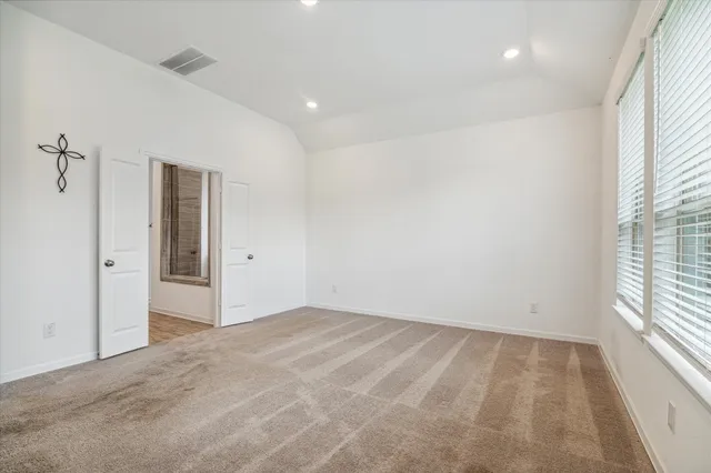 an empty room with windows