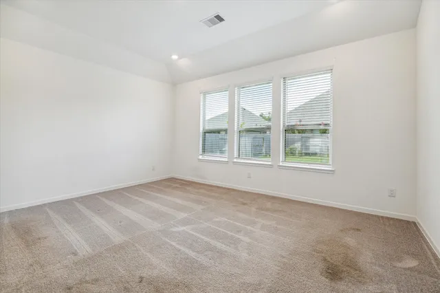 an empty room with windows