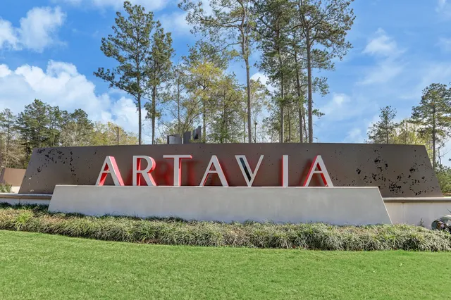 a view of a park with swings and slides