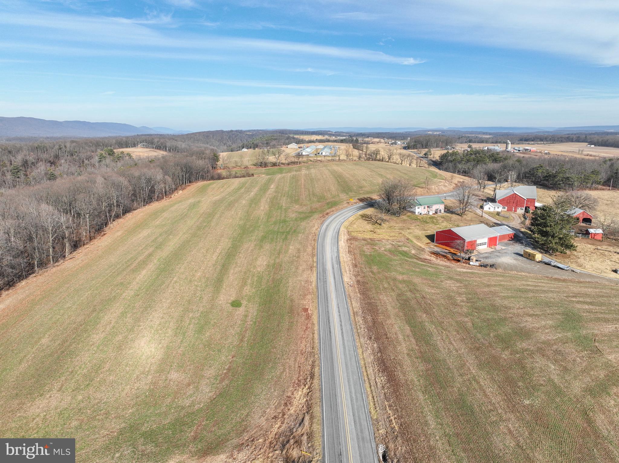 7372 Chaneysville Road Clearville, PA 15535 - Photo 122 of 146 Serene countryside with winding road and farms.