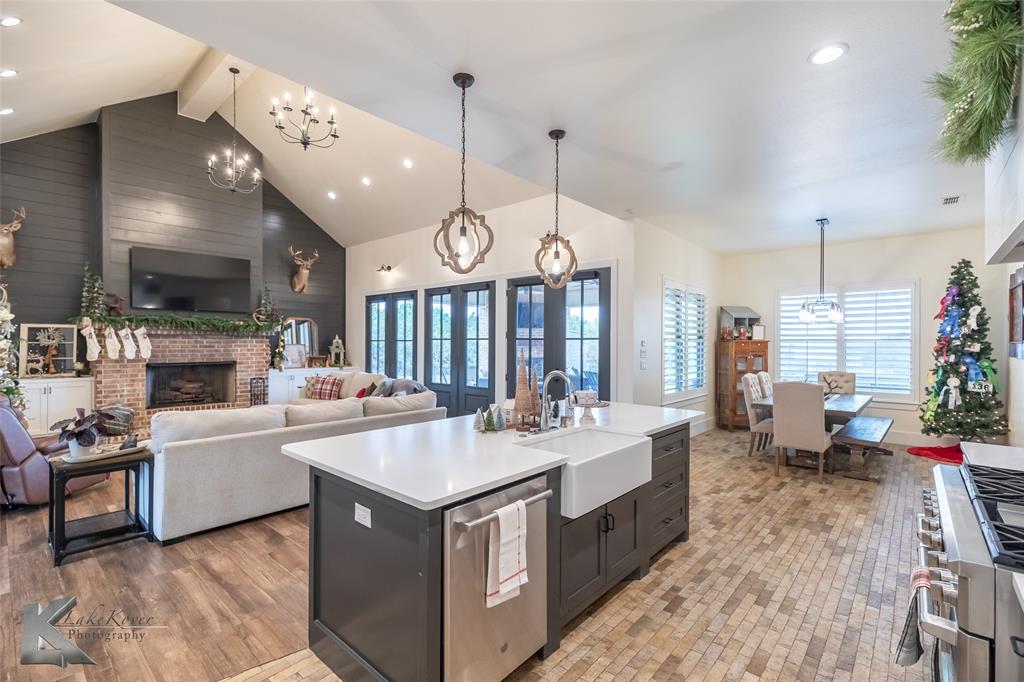 622 Ranch Road Buffalo Gap, TX 79508 - Photo 14 of 40 a large kitchen with a large counter top appliances and cabinets