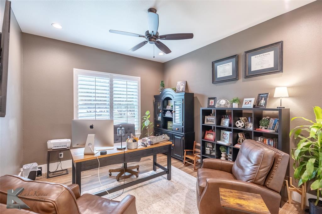 622 Ranch Road Buffalo Gap, TX 79508 - Photo 22 of 40 a living room with furniture and a window