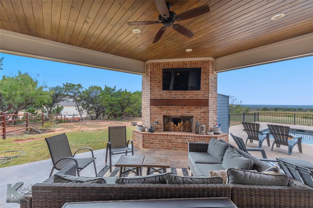 622 Ranch Road Buffalo Gap, TX 79508 - Photo 34 of 40 a view of a patio with couches table and chairs