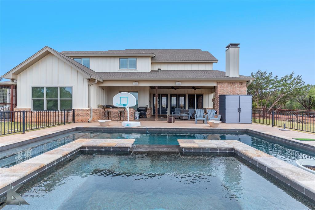 622 Ranch Road Buffalo Gap, TX 79508 - Photo 36 of 40 a view of living room with furniture and large windows