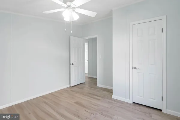 a bathroom with a sink a mirror and a toilet