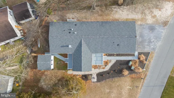 a view of a lake with a house swimming pool and outdoor space