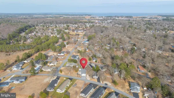 an aerial view of residential house with outdoor space