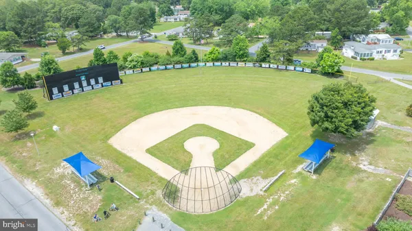 a view of an outdoor space and tennis court
