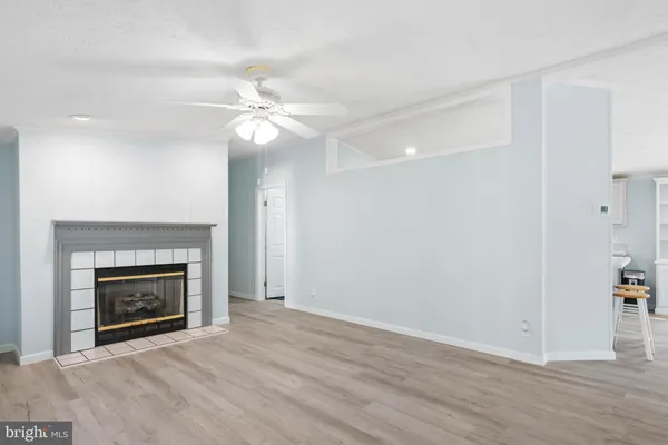 a living room with a fireplace