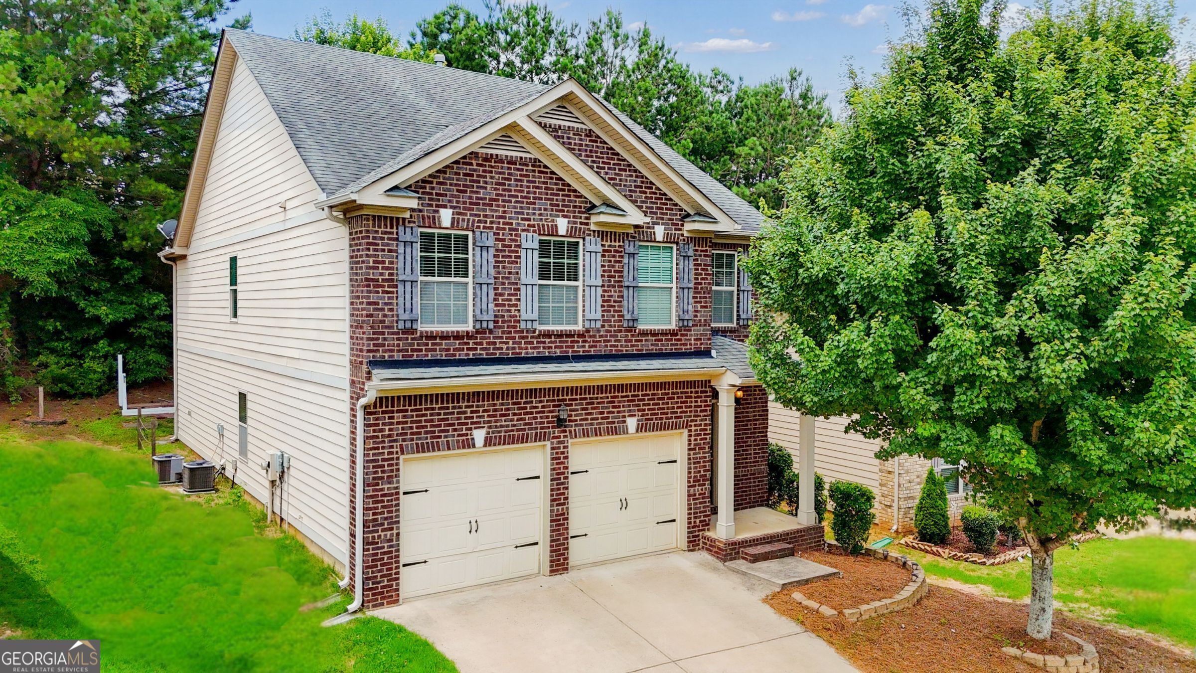 49 Torero Trail Newnan, GA 30263 - Photo 1 of 1 a front view of a house with a yard
