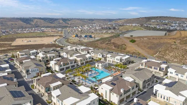 an aerial view of residential building with parking space