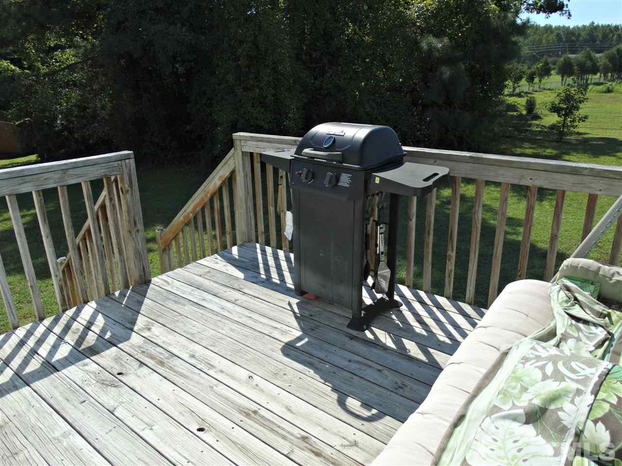 4916 Topstone Road Raleigh, NC 27603 - Photo 24 of 25 a view of balcony with furniture