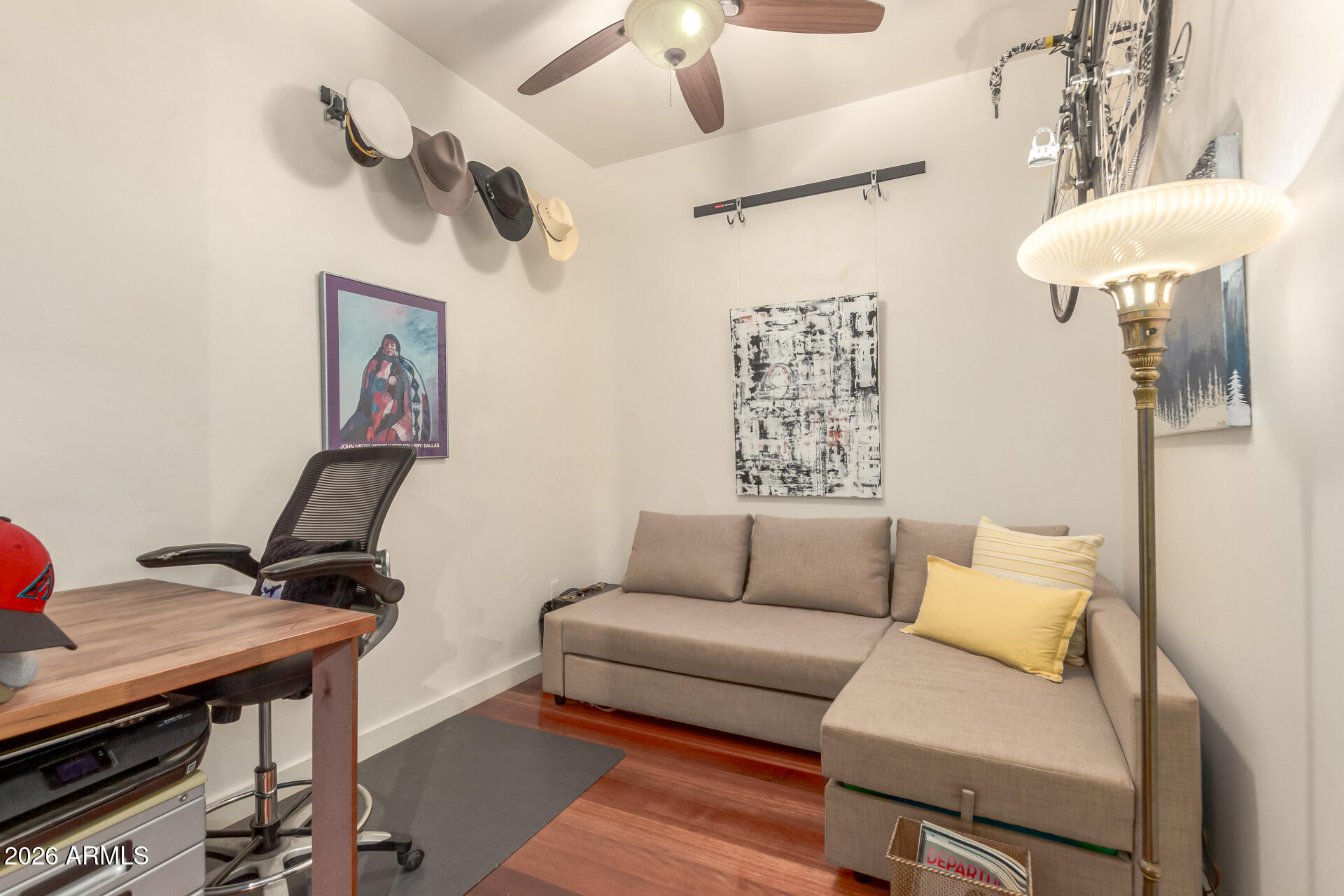 310 South 4th Street, Unit 1109 Phoenix, AZ 85004 - Photo 21 of 36 a living room with furniture and a window