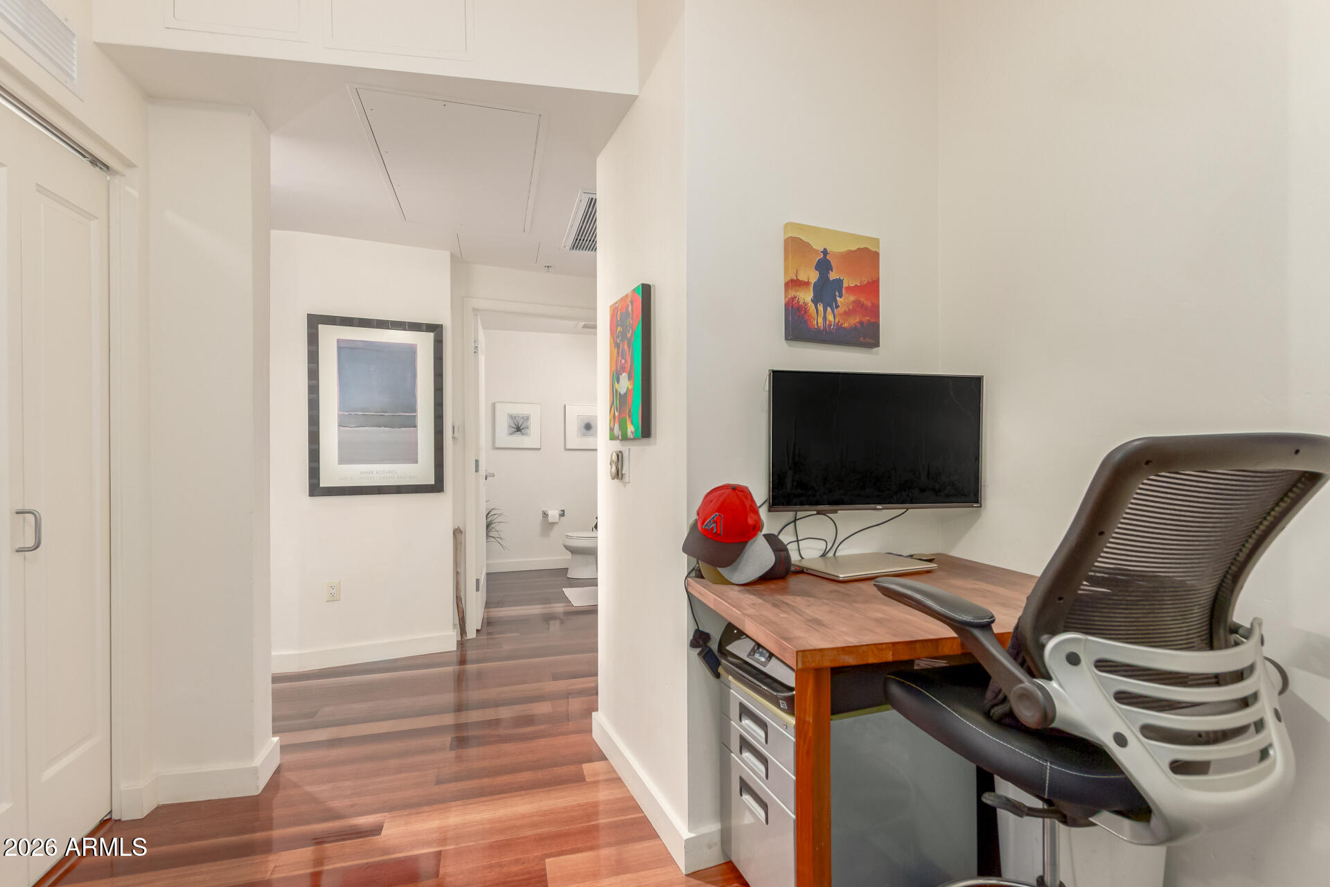 310 South 4th Street, Unit 1109 Phoenix, AZ 85004 - Photo 23 of 36 a view of a workspace with furniture