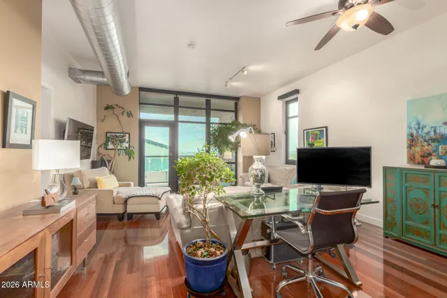 a workspace with furniture and window