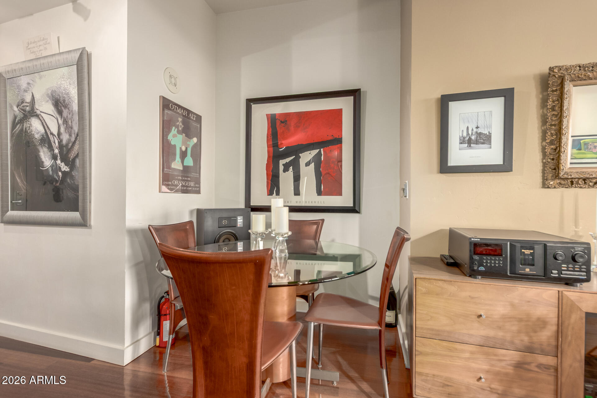 310 South 4th Street, Unit 1109 Phoenix, AZ 85004 - Photo 8 of 36 a dining room with furniture and window