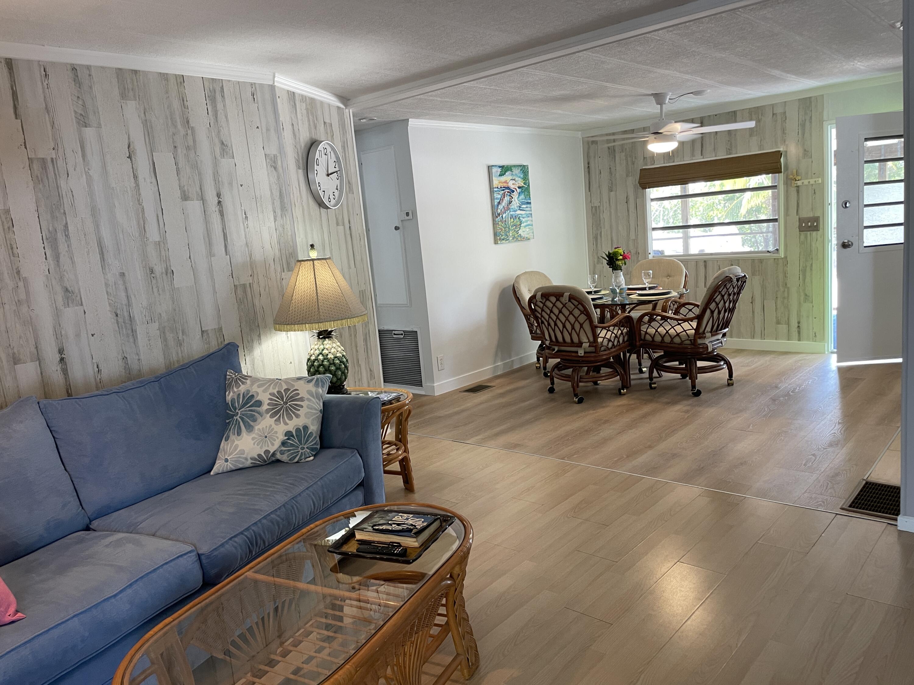 27853 Coral Shores Road Summerland Key, FL 33042 - Photo 20 of 47 a living room with furniture and wooden floor