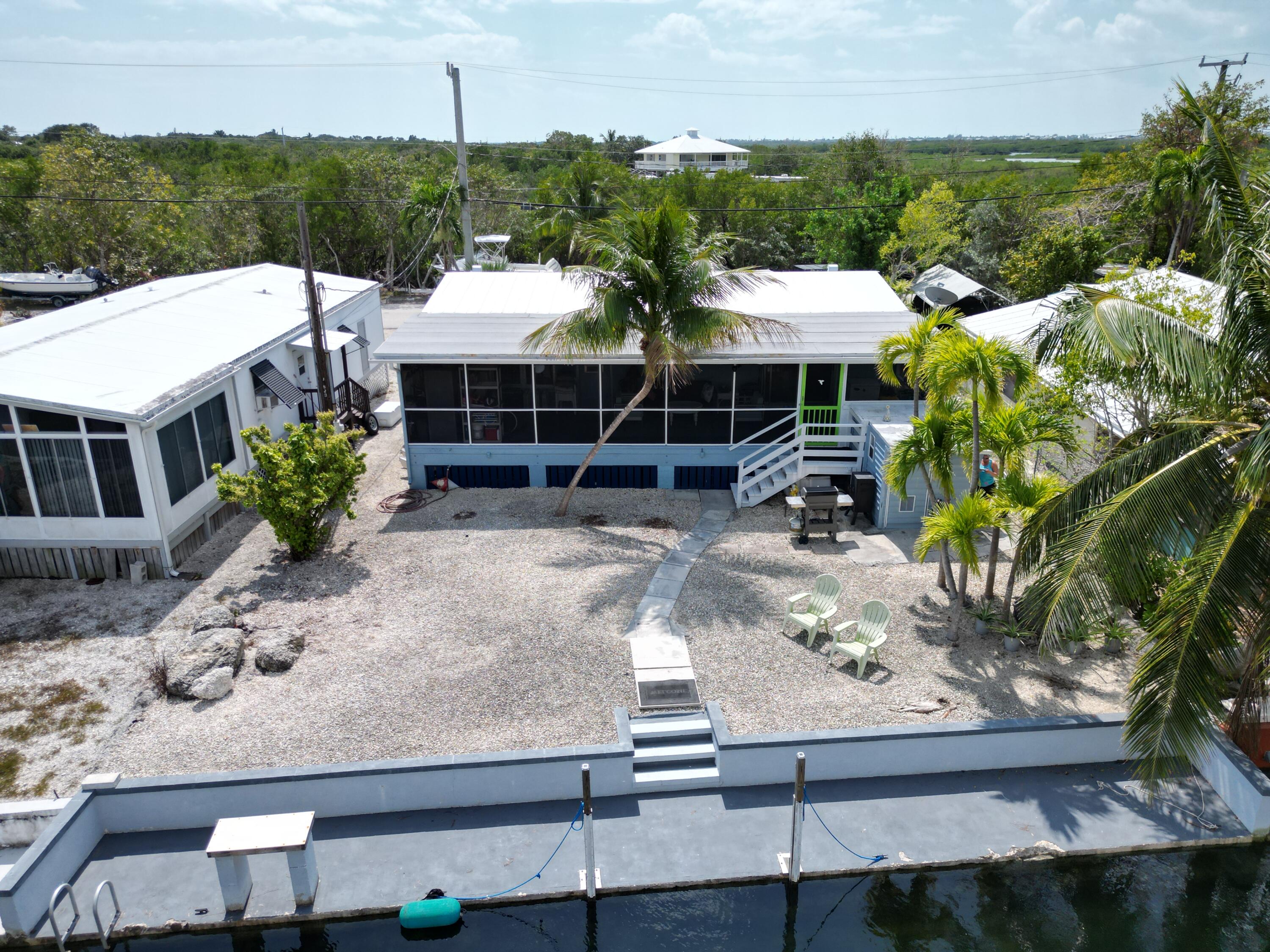 27853 Coral Shores Road Summerland Key, FL 33042 - Photo 38 of 47 a view of a house with backyard and sitting area