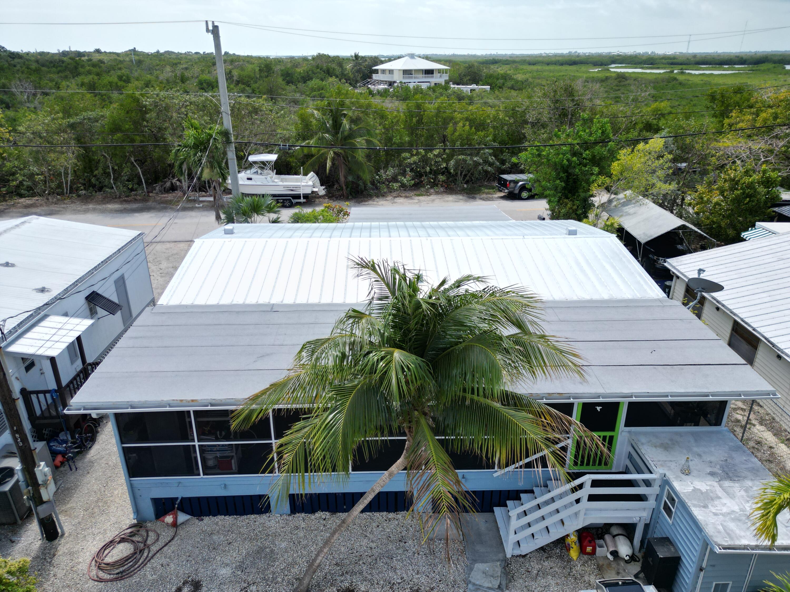 27853 Coral Shores Road Summerland Key, FL 33042 - Photo 41 of 47 an outdoor space with furniture and garden