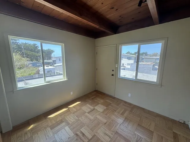 an empty room with windows