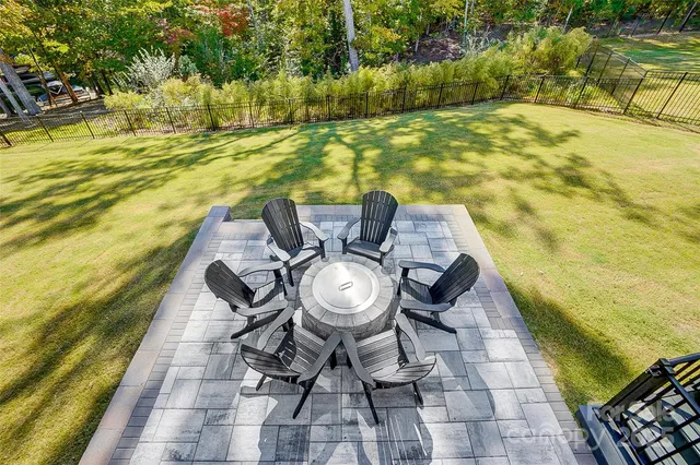 a view of swimming pool with seating area