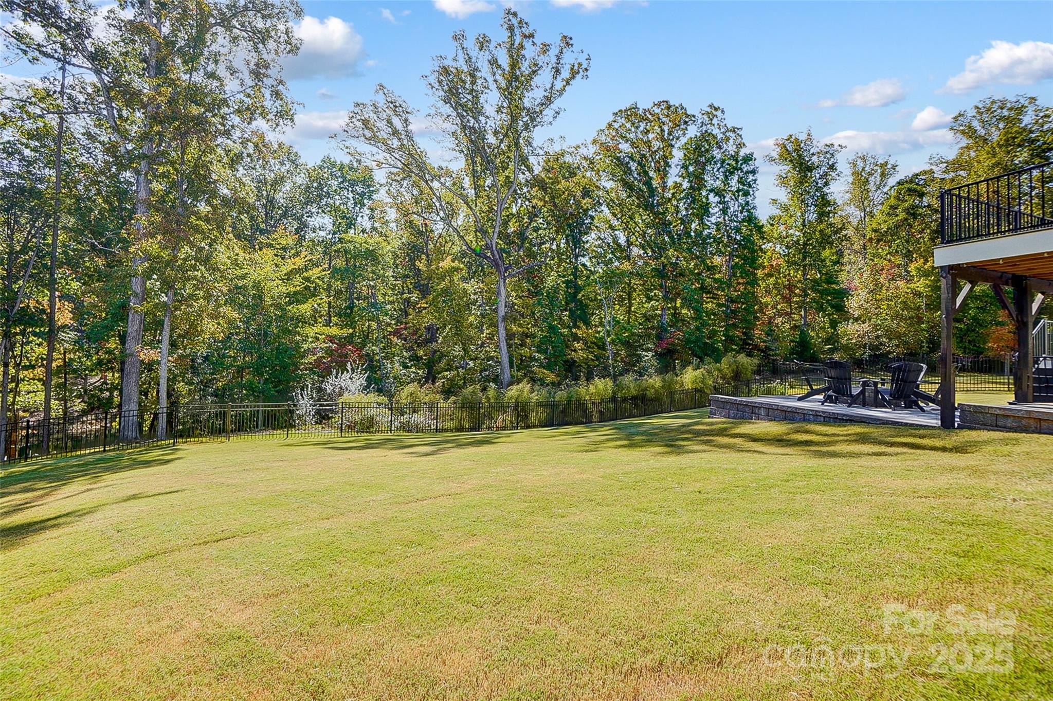 4116 Spring Cove Way Belmont, NC 28012 - Photo 37 of 44 a view of a swimming pool with an outdoor space and seating area