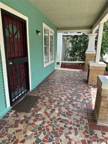 a view of entrance gate of a house