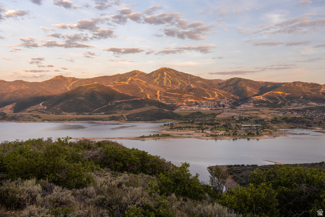 9269 North Sunset Road Kamas, UT 84036 - Photo 8 of 21 Expansive mountain landscape featuring a large body of water, distant structures, and natural foliage
