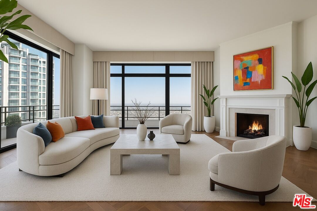 a living room with furniture large window and a fireplace