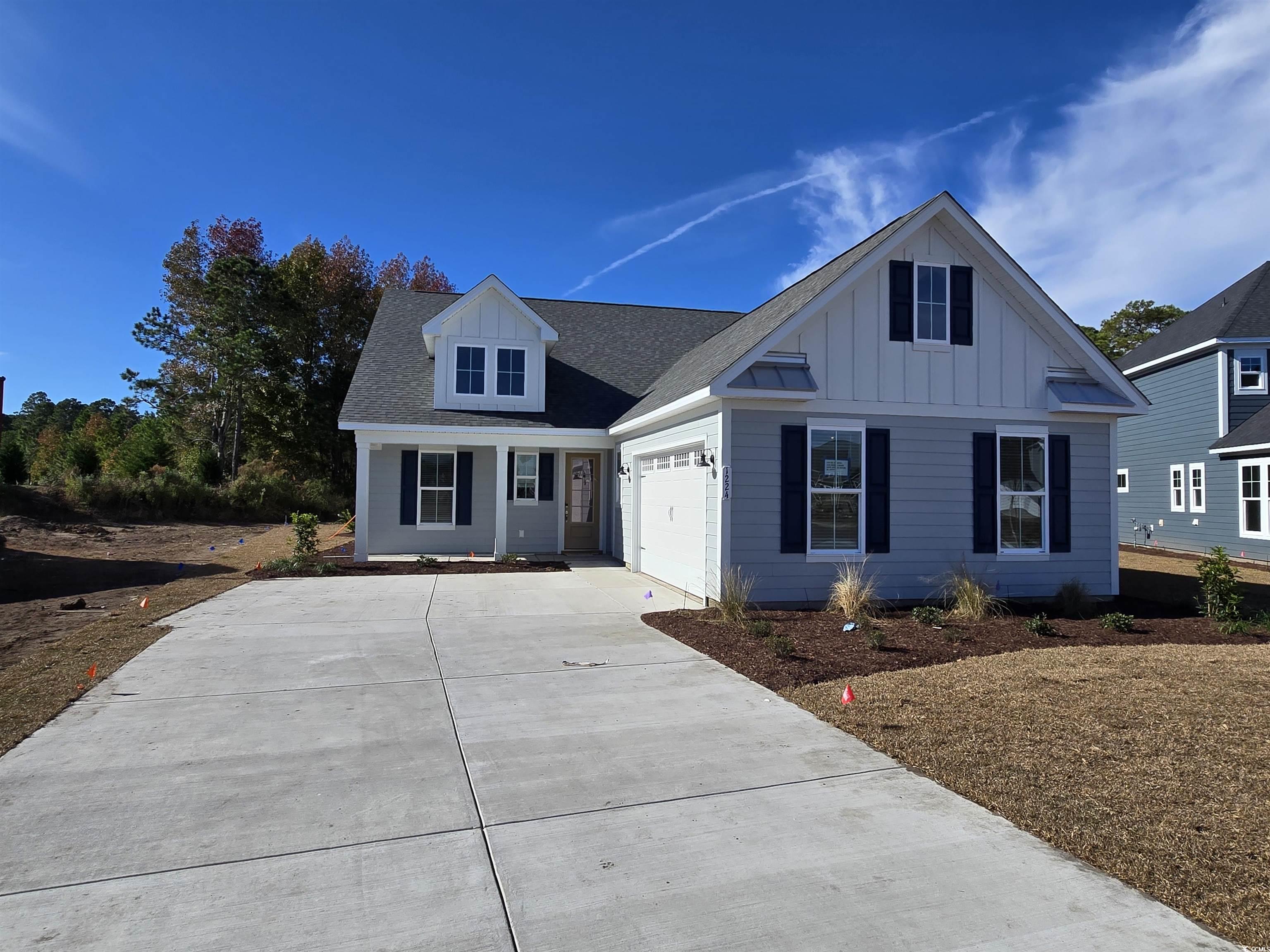 View of front of home with a garage