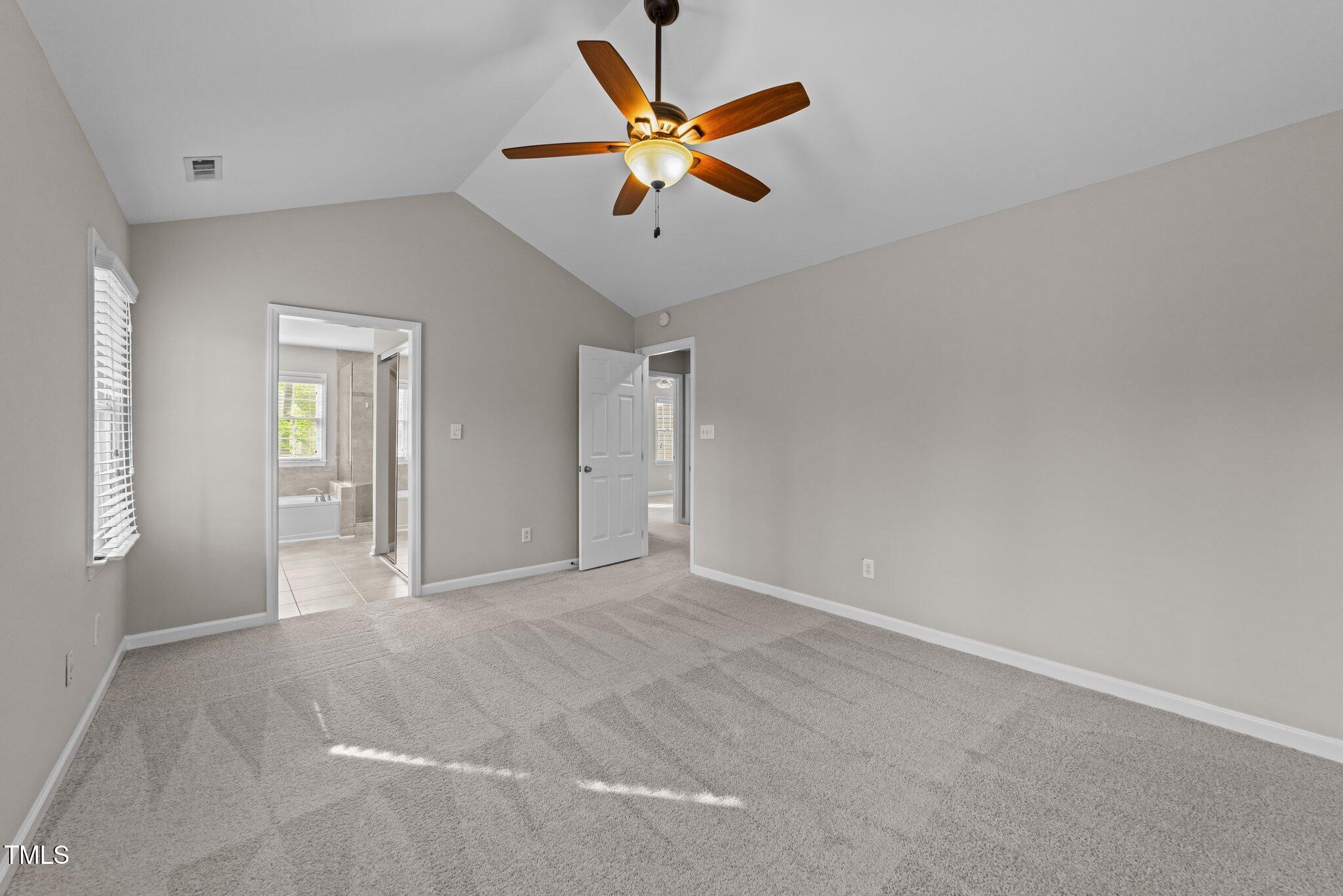 5301 Tilford Lane Raleigh, NC 27613 - Photo 26 of 42 an empty room with fan and windows