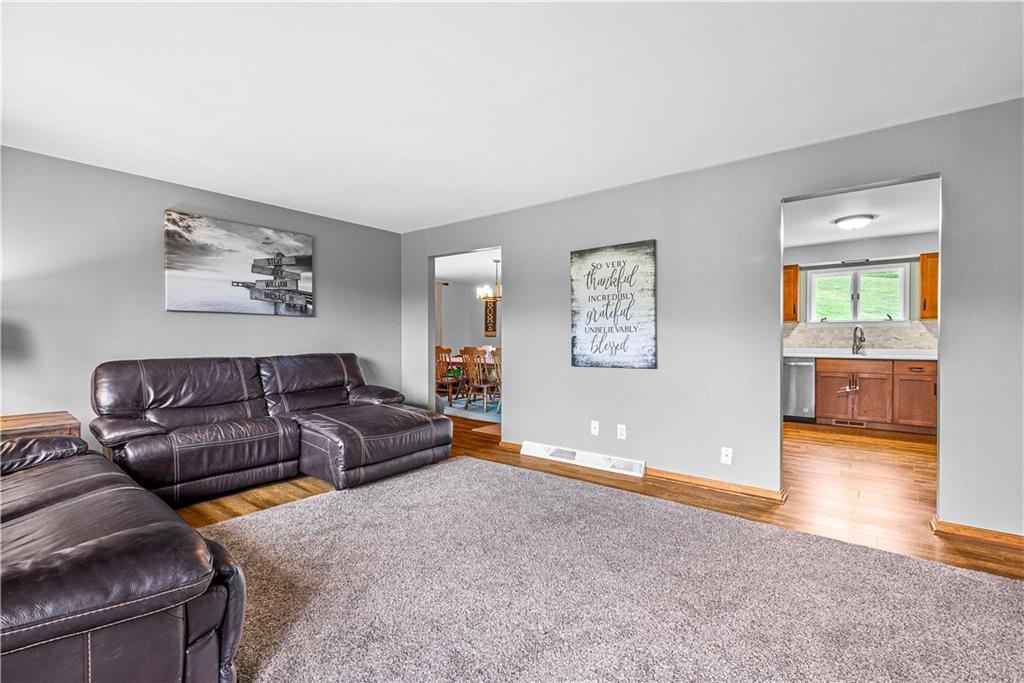 249 Fulton Road Canonsburg, PA 15317 - Photo 2 of 25 a living room with a couch and a view of kitchen