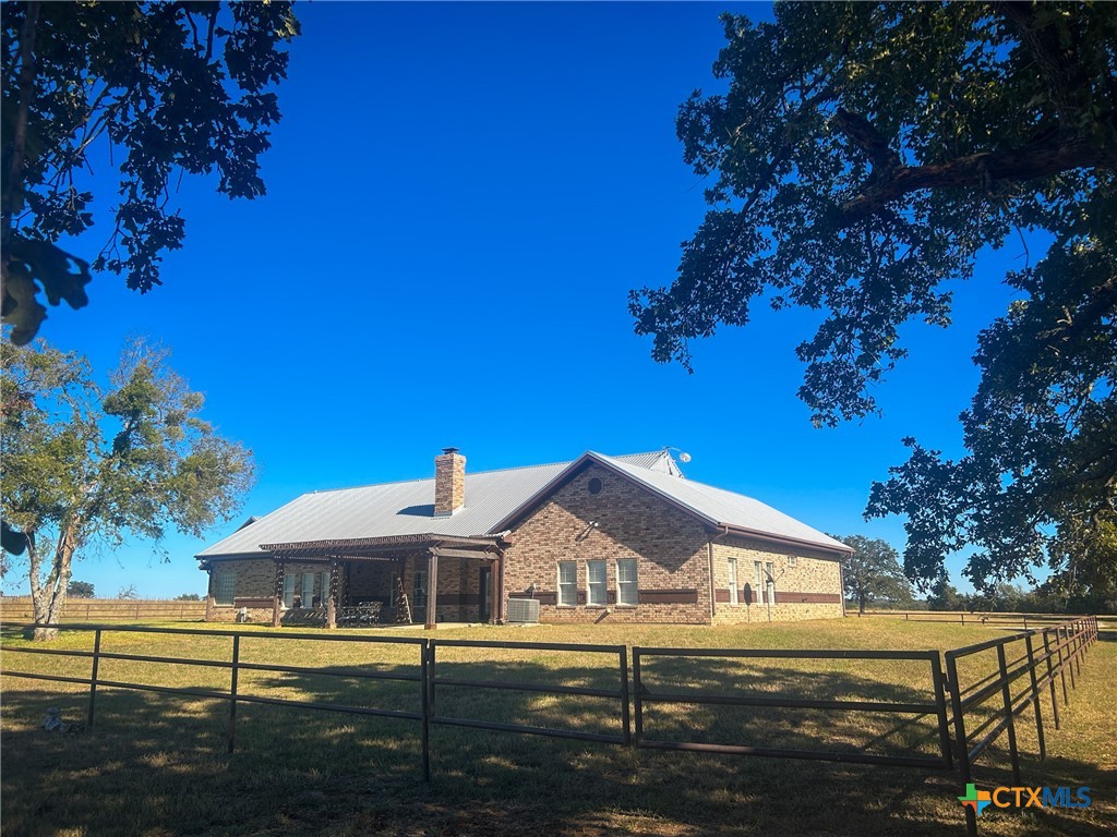 2776 South Highway 77 Cameron, TX 76520 - Photo 3 of 30 a front view of a house with a yard