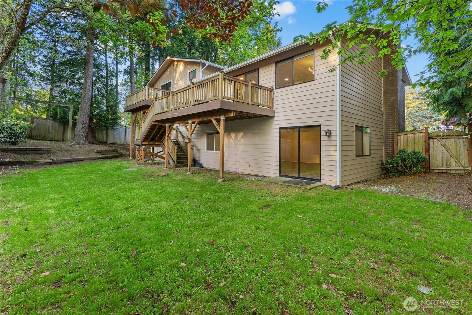 9607 122nd Avenue Southeast Renton, WA 98056 - Photo 32 of 32 a view of a house with a yard and sitting area