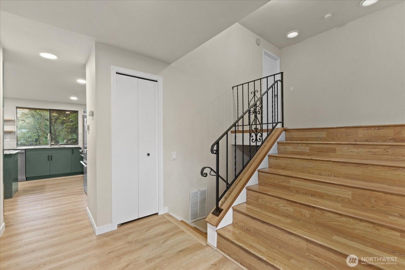 9607 122nd Avenue Southeast Renton, WA 98056 - Photo 4 of 32 a view of entryway and hall with wooden floor