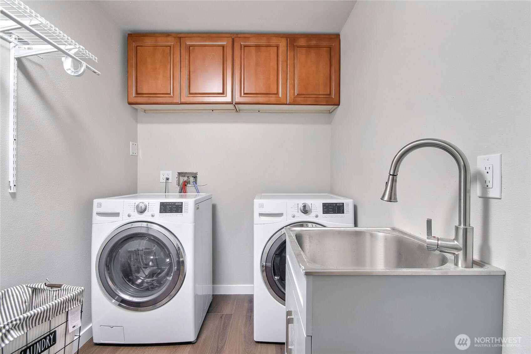 2308 Northeast 27th Street Renton, WA 98056 - Photo 21 of 24 a utility room with sink dryer and washer