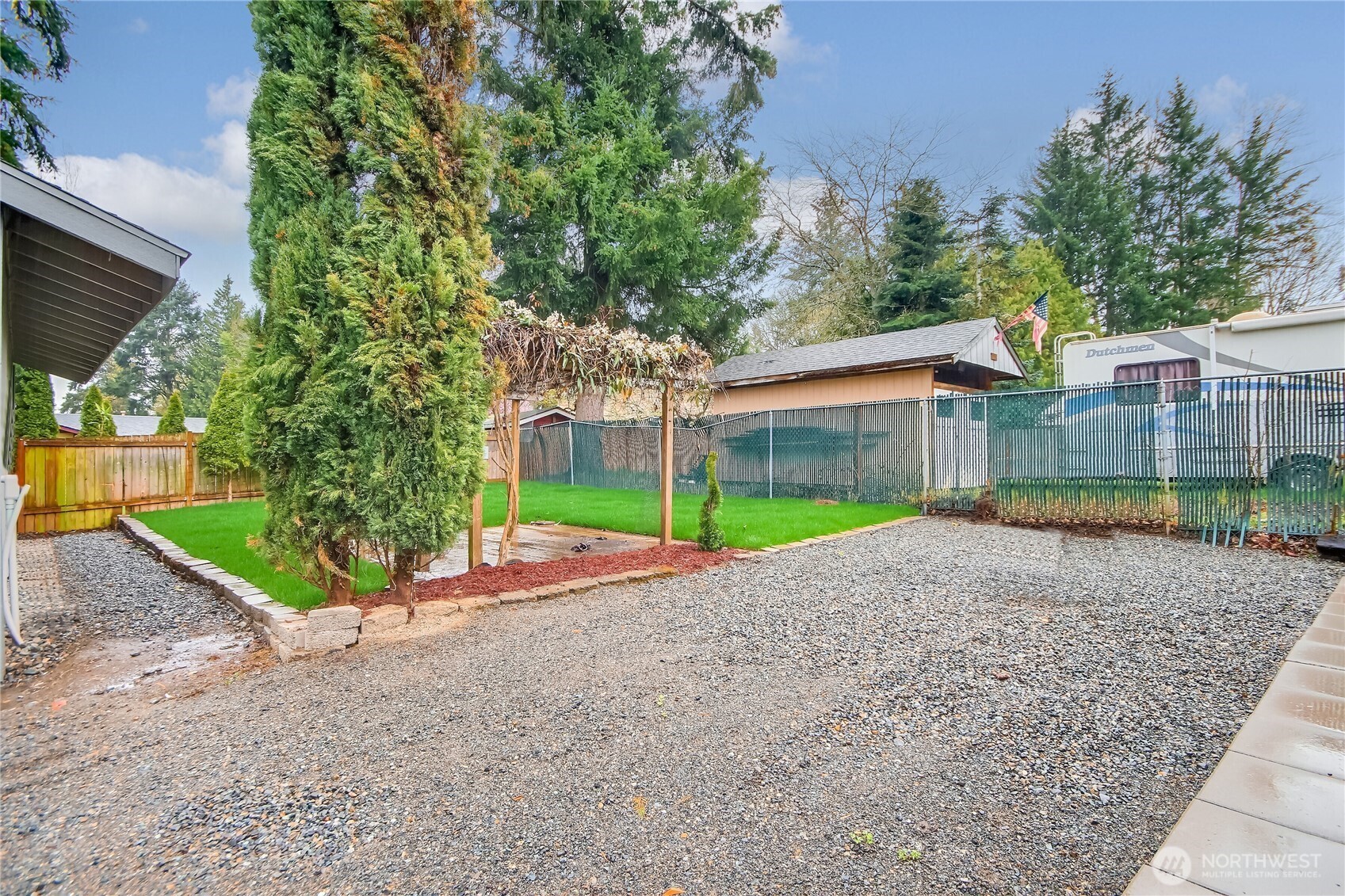 2308 Northeast 27th Street Renton, WA 98056 - Photo 23 of 24 a view of a house with a yard and plants