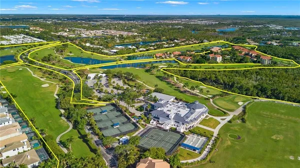 a view of a swimming pool with a yard