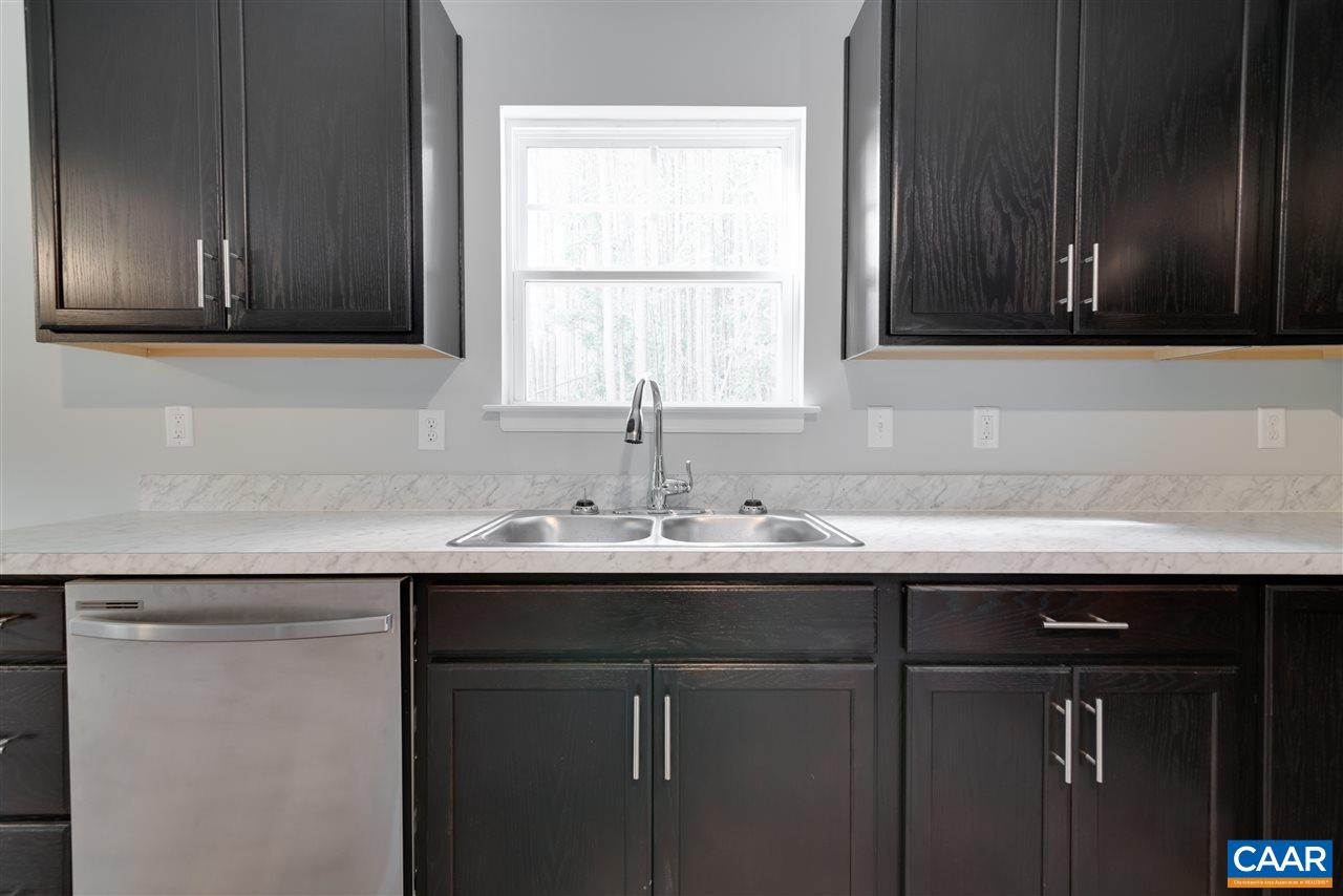 276 Greenes Corner Road Bumpass, VA 23024 - Photo 8 of 16 a sink cabinets with wooden floor