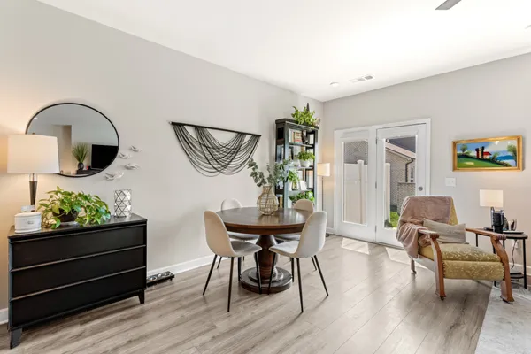 a workspace with furniture and wooden floor