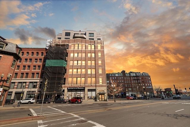 a view of a building and a street