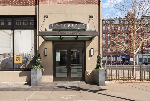a view of a building with a street