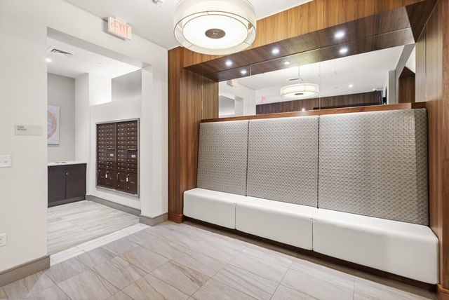 a bathroom with a tub and shower