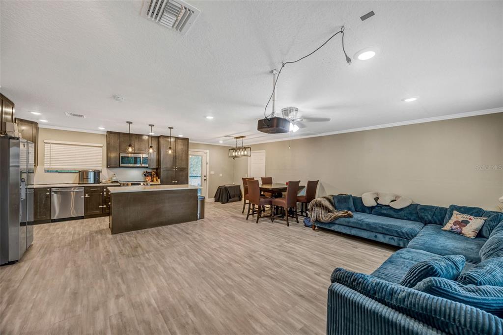 7149 Spruce Drive Weeki Wachee, FL 34607 - Photo 5 of 23 a kitchen with stainless steel appliances lots of counter top space