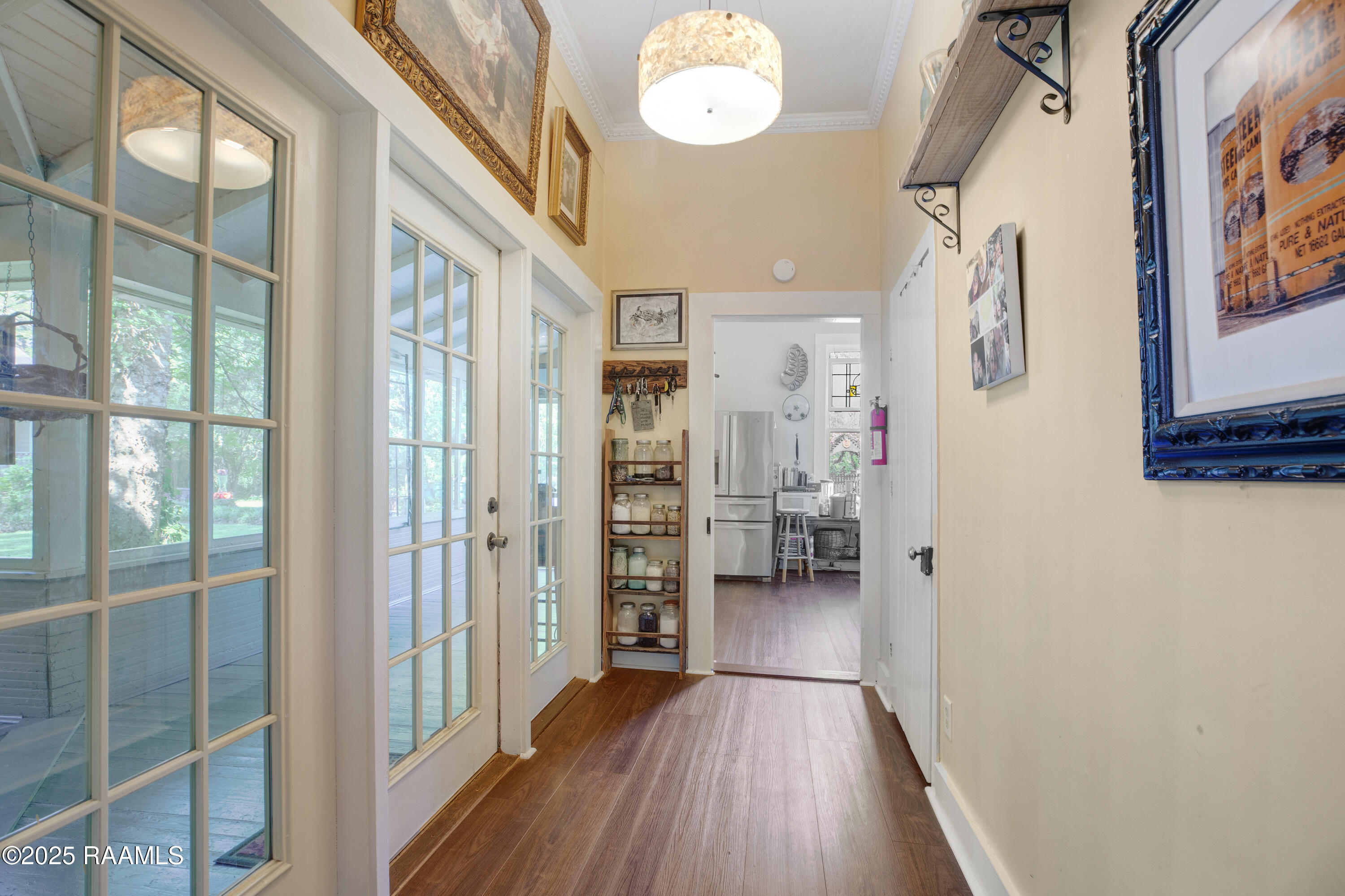 604 Main Street Washington, LA 70589 - Photo 11 of 49 French doors to hall and kitchen