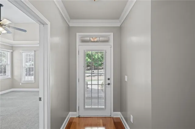 a view of empty room with windows