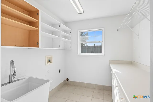 a view of a kitchen with a sink