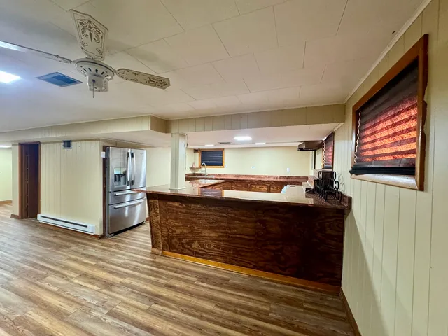 a view of living room with furniture and window