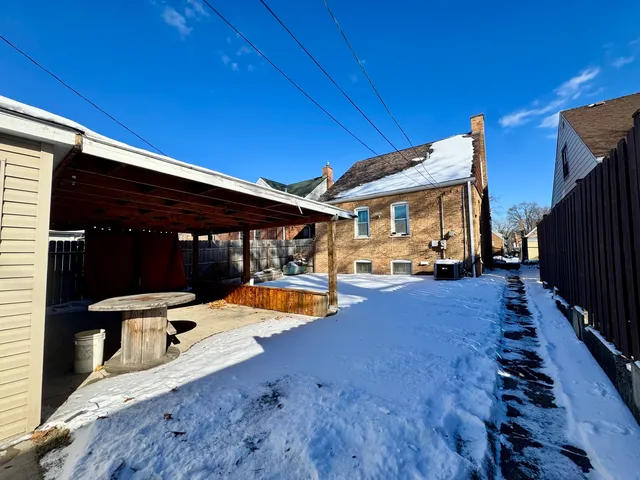 a view of a backyard of the house