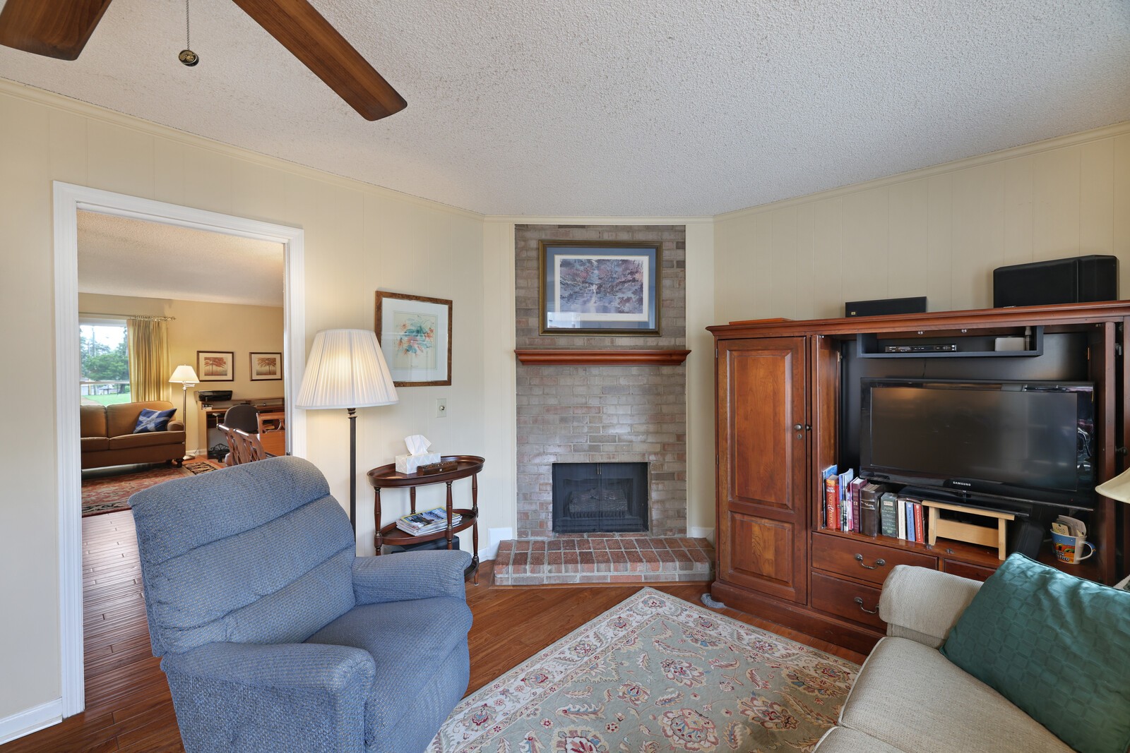 4001 Anderson Road, Unit K24 Nashville, TN 37217 - Photo 14 of 36 a living room with furniture and a flat screen tv